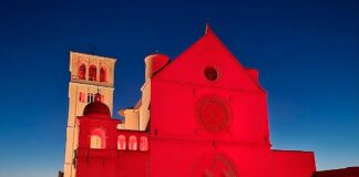 Worldwide Day of Giving: Basilica of St Francis Lit Up in Red Assisi